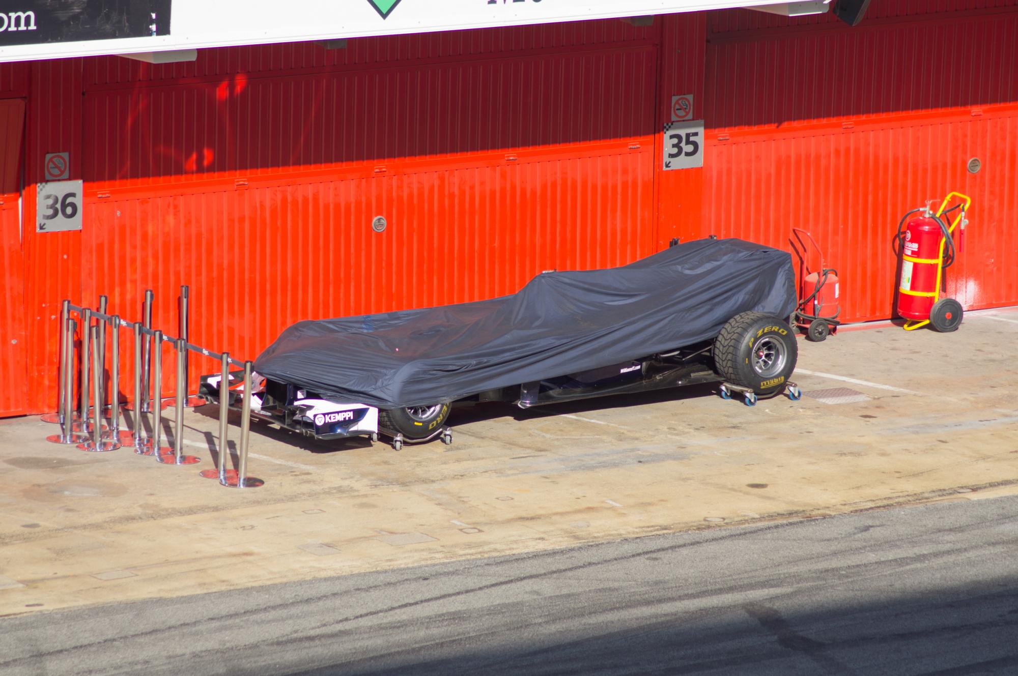 Williams F1 car stands covered during Formula 1 test days on the Circuit de Barcelona-Catalunya near Montmeló