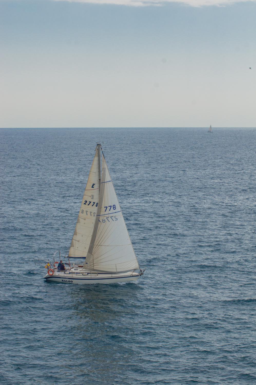 Yacht sailing near the town of Blanes