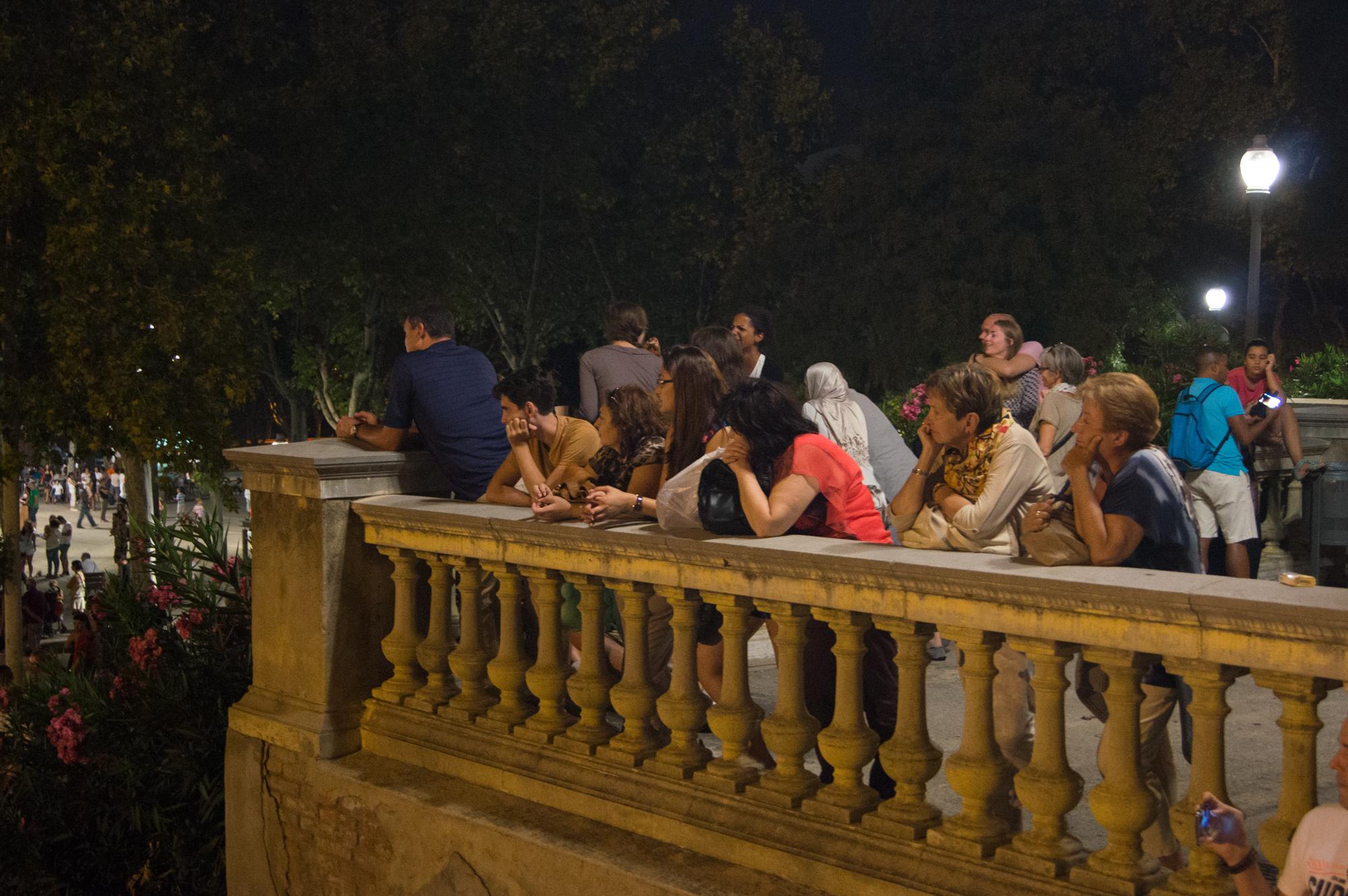 People watching Font màgica de Montjuïc show in Barcelona