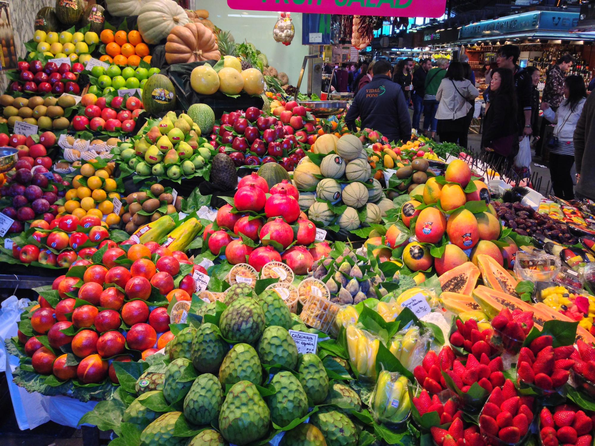 Fruits on the counter at La Boqueria market in Barcelona